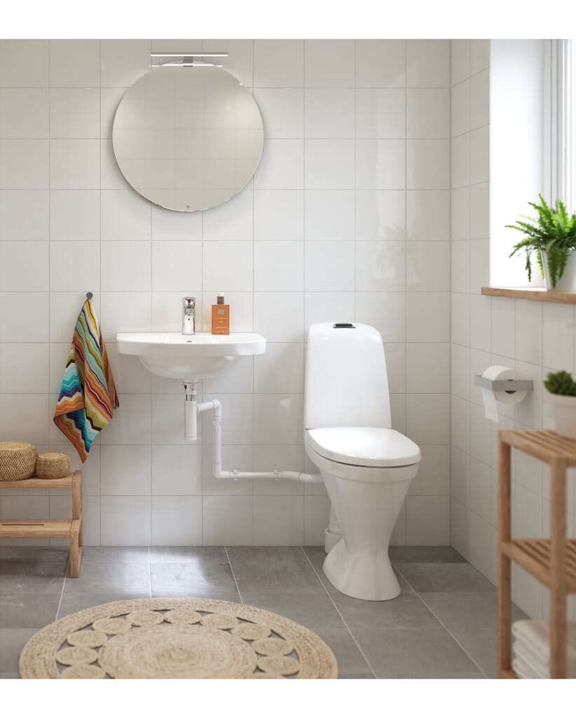 Golvstående WC-stol med extra anslutning för avlopp
